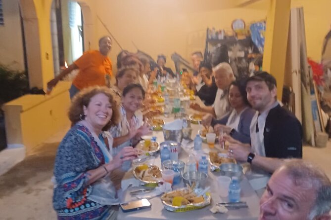 A Evening Cultural Experience Through Food Cooking Class St. Croix - Music, local drinks, and a full crab dinner