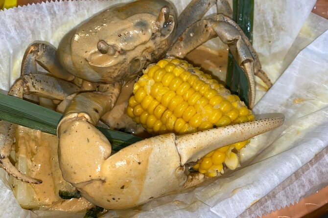 A Morning Cultural Experience Through Food Cooking Class St. Croix - Choosing a crab at Crabarama