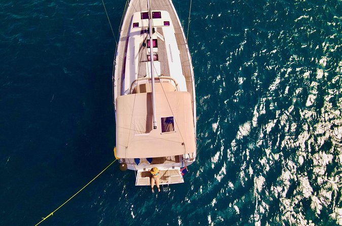 Christmas Cove and Pizza Pi Happy Hour Sail Tour - Timing, meeting point, and cancellation details