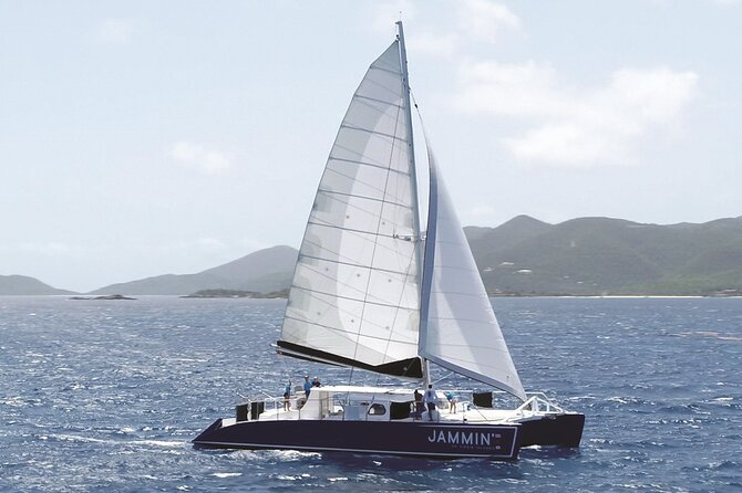 A catamaran anchored off the green hills of St Thomas